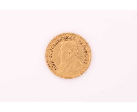 A South African 1/2 pond (pound) gold coin, dated 1894, total weight of item 4.0 grams.