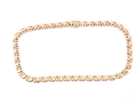 A 9ct yellow gold elephant-shaped link necklace, secured with a tongue and groove clasp and a figure of eight safety catch, w