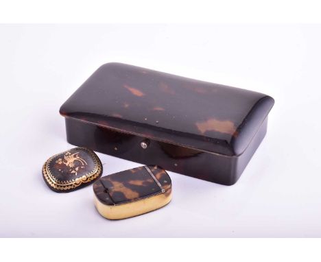 A 9 carat gold and tortoiseshell box, rounded rectangular with gold mounted hinged cover and push button thumbpiece; 12 x 7 m