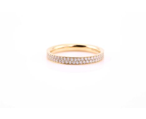 Georg Jensen. An 18ct yellow gold 'Magic' eternity ring, pave set with round brilliant-cut diamonds, size 57 (size P), in ori