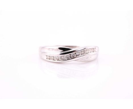 A crossover half eternity ring, consisting of diamonds estimated total weight of 0.20ct, channel set in a white metal mount, 