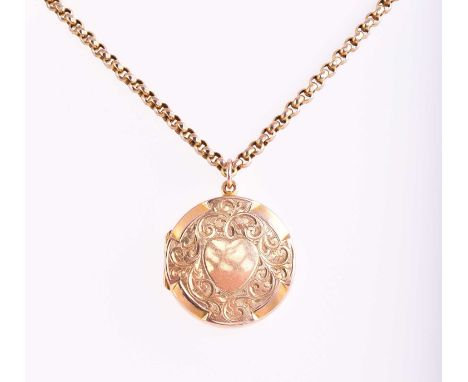 A 9ct yellow gold locket with chain, consisting of a round locket approximately measuring 24.6 mm, with floral scroll and hea