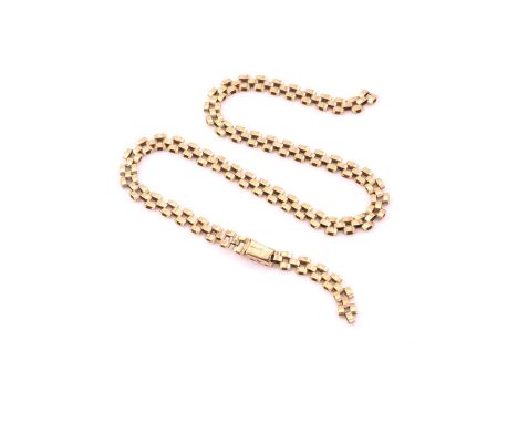 A 9ct yellow gold brick link necklet, close with a tongue and groove clasp and figure of eight safety catch, hallmarked as 37