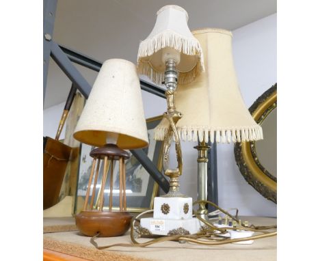 Three lamps, one brass effect, one marble based, and wooden mid century style lamp with Canberra emblem 
