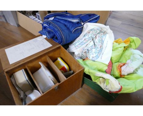 First Aid box with vintage first aid equipment and bedding, sleeping bag, fabric etc