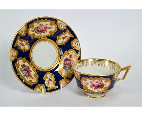 A Regency Flight, Barr and Barr Royal Porcelain Works, Worcester cabinet tea cup and saucer, finely painted and gilded with i