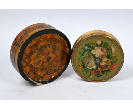 An antique ivory circular trinket box, richly painted and gilded with cherubs and floral garlands, the base painted with vase