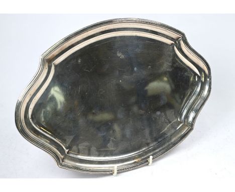 A silver lozenge-shaped trinket tray, Charles &amp; Richard Comyns, London 1921, 11.1oz (348g), 31 x 22cmrim bet over at one 