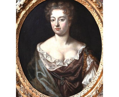 Manner of Sir Godfrey Kneller -&nbsp; An 18th century portrait of Queen Anne, oil on canvas, 73 x 61.5cm (oval)
