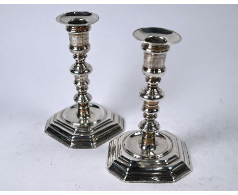 A good pair of William III cast Britannia standard silver baluster candlesticks on octagonal moulded bases, Andrew Raven, Lon