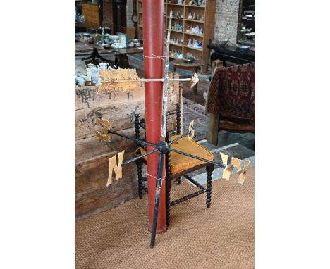 An old weathered iron and steel rooftop weather vane, 95 cm x 95 cm x 143 cm h