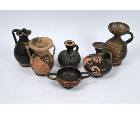 A collection of six small Greek Attic red-figure pottery items including amphora with bird decoration, 10 cm high; two squat 