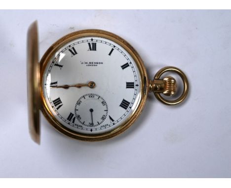 A 9ct gold half hunter pocket watch with Swiss 15-jewel top-wind movement, by J.W. Benson, gold dust-cover, enamel dial with 