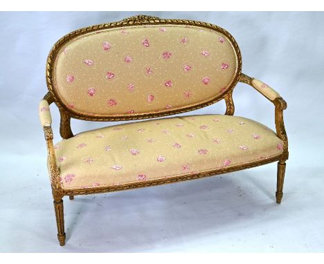 An antique carved gilt-wood salon sofa, in contemporary Vanessa Arbuthnott 'shell'&nbsp; fabric