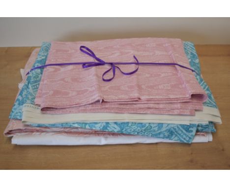 A collection of vintage fabrics. A length of pink moiree cotton, 72x64'. Two lengths of 'Sonata' pattern by Anna French 1989 