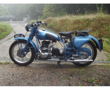 A 1951 Douglas 350 Mk V, registration number NKP 13, blue. BMW are normally associated with parallel twins, but Douglas were 
