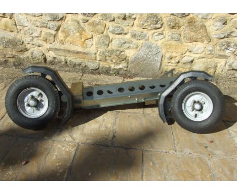 A Bikelug T400 collapsible motorcycle trailer, with spare wheel bracket, a spare wheel, lighting system and loading system, o