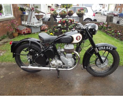 A 1957 BSA M21, registration number UNA 443, frame number BM20S 6626, engine number BM21 7577, black/cream. BSA's 600cc post 