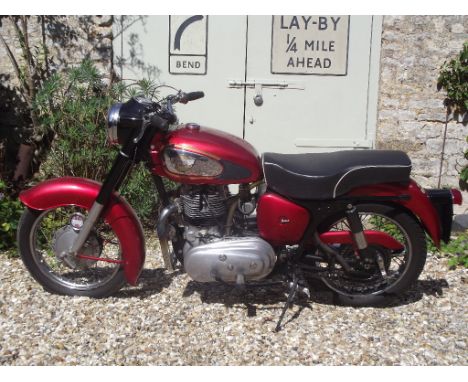 A 1960 Royal Enfield Meteor Minor, registration number 134 RPK, red. A rare motorcycle in period and now an even rarer sight 