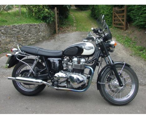 A 2006 Triumph Bonneville T100, registration number HF56 EGJ, frame number SMTTJ9152G6255344, engine number 256387, black and