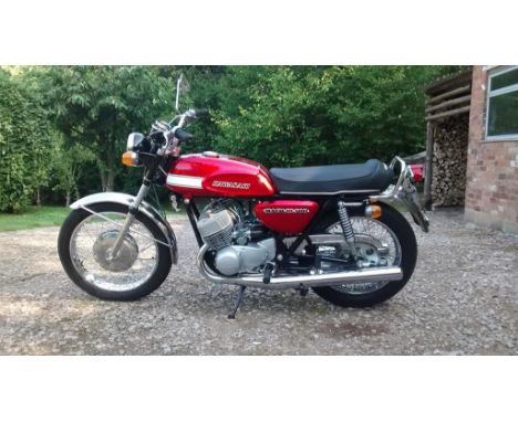A 1970 Kawasaki H1, registration number is BHY 366H, red. Introduced in 1969, Kawasaki's H1 500cc two stroke screamer would s
