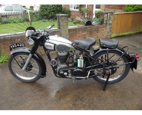 A 1951 Norton Big 4, registration number VAS 420, frame number F339832, silver and black. Norton's Model 1 or more commonly k