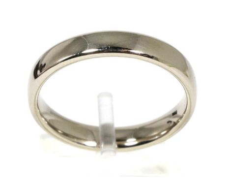 An 18 carat white gold band ring, finger size R6.0 grams 