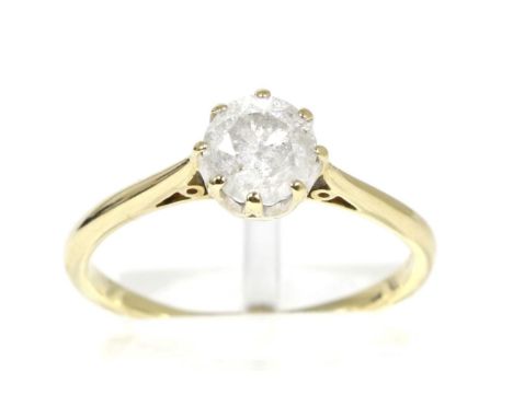 A 9 carat gold solitaire diamond ring, a round brilliant cut diamond in a claw setting, to knife edge shoulders, estimated di