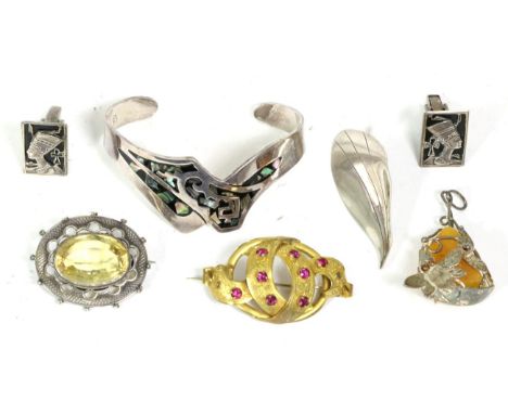 A Danish leaf brooch, by Hermann Siersbol, measures 6.5cm by 2cm; a Scottish citrine brooch, an oval cut citrine in a collet 