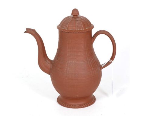 An 18th Century Staffordshire redware coffee pot, circa 1770, baluster form with engine turned decoration on circular foot wi