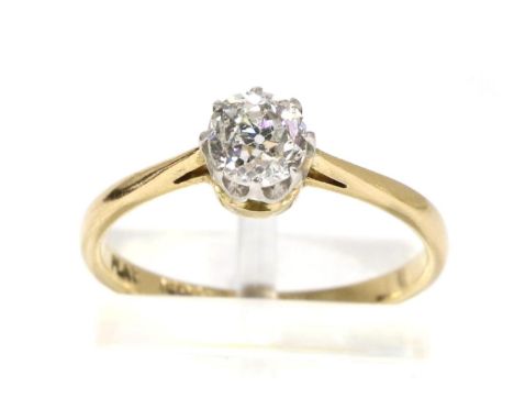 An old cut solitaire diamond ring, in a claw setting, to knife edge shoulders, estimated diamond weight 0.60 carat approximat