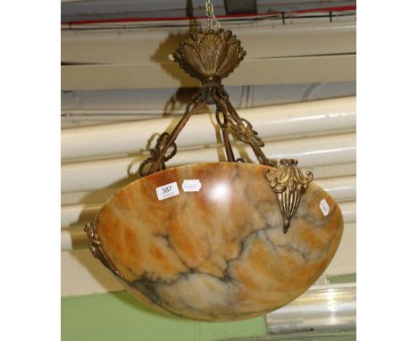 An Art Deco French alabaster ceiling light purchased from Hector Finch 