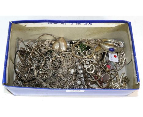 A large quantity of silver and metal jewellery, including a lapis lazuli set chased silver hinge opening bangle, a mosaic inl