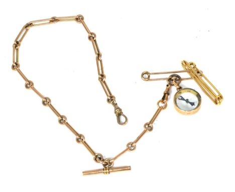 A watch chain, chain links stamped 9ct and an attached compass with the side inscribed ''FR Duke of Teck Feb 1879''. To our u
