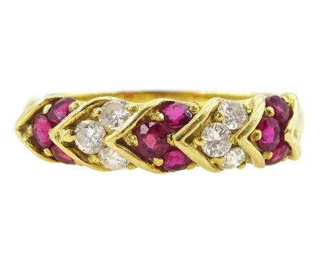 18ct gold round brilliant cut diamond and ruby heart design eternity ring, London 1991, total diamond weight approx 0.30 cara