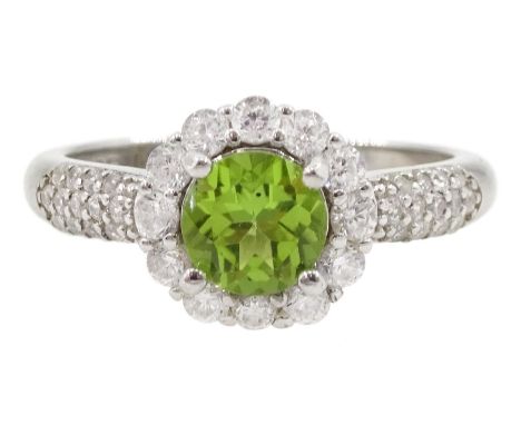 Silver peridot and cubic zirconia flower cluster ring, stamped 925Condition Report:Size P, good condition 