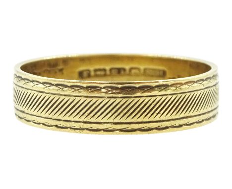 18ct gold wedding band, with engraved decoration, Birmingham 1967Condition Report:Approx 3.5gm, size Q-R, depth = 4.8mm