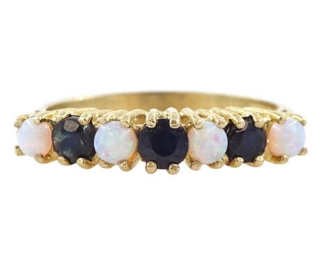 9ct gold seven stone sapphire and opal ring, hallmarkedCondition Report:Approx 2gm, size M-N