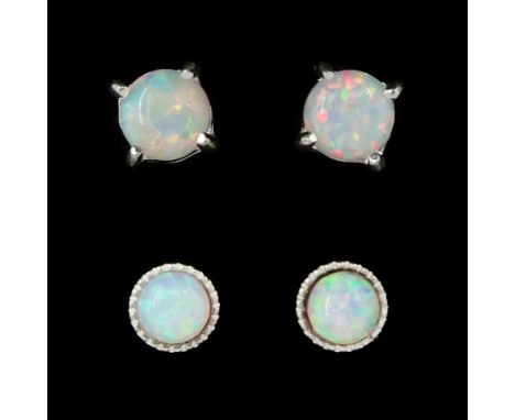 Two pairs of silver opal stud earringsCondition Report:Max diameter = 5mm, good condition