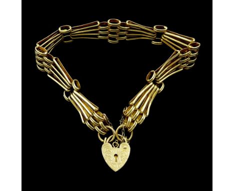 9ct gold fancy tapered four bar gate bracelet, with heart locket clasp, hallmarkedCondition Report:Approx 11.25gm