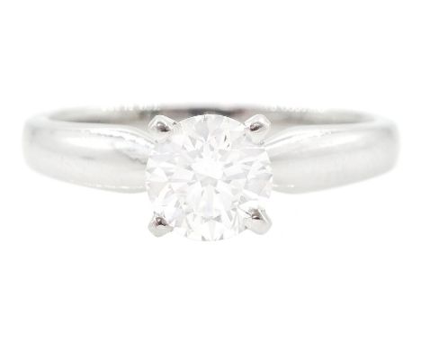Platinum single stone round brilliant cut diamond ring, diamond 0.70 carat with GIA report check: colour E, clarity VS1Condit