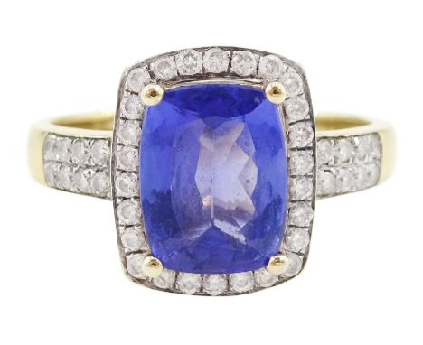 14ct gold cushion cut tanzanite and round brilliant cut diamond cluster ring, with diamond set shoulders, hallmarked, tanzani