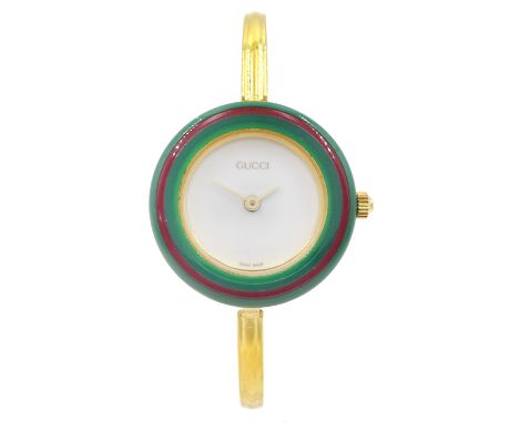 Gucci ladies gold-plated quartz wristwatch, Ref. 11/12.2, with eleven interchangeable coloured ring bezels, boxed with warran