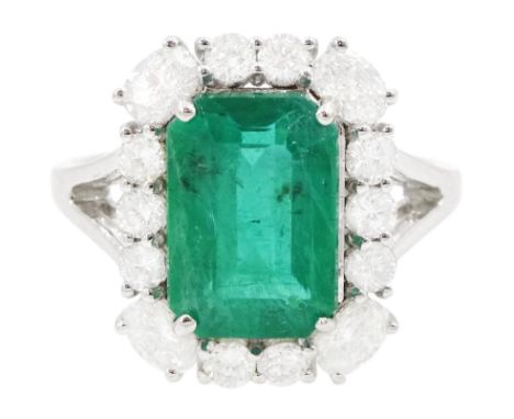 18ct white gold octagonal cut emerald, round and oval cut diamond cluster ring, stamped, emerald approx 2.90 carat, total dia