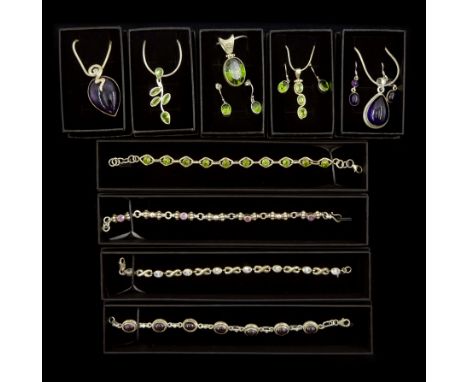 Silver stone set jewellery including two amethyst necklaces, pair of earrings and a bracelet, three peridot necklaces, two pa