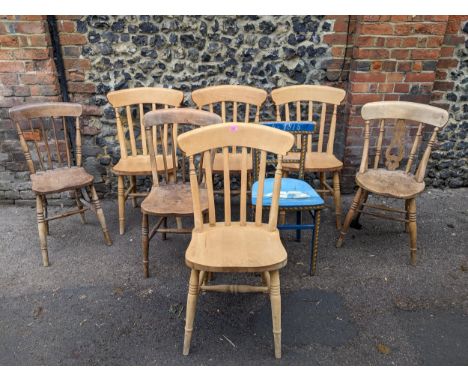 A group of eight 19th century and later country and kitchen chairs to include a set of four slat back kitchen chairs, a paint