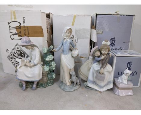 Boxed Lladro and Nao ornaments to include a Lladro ornament of a dog entitled 'My Favourite Companion'Location: 