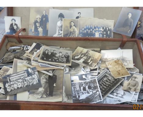 Leather suitcase with Union Castle travel stickers and large amount of Japanese photographs from 40s to the 80s with a wide v
