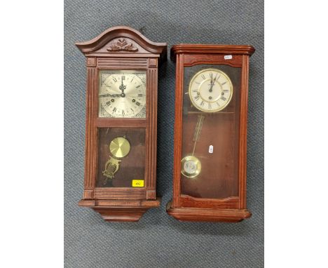 Two reproduction mahogany cased wall hanging clocks to include an 8-day clock striking on five gongs, and an oak cased mantel