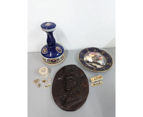 Nelson related items to include a signed composition portrait plaque, a commemorative Trafalgar decanter and plate, Scrimshaw